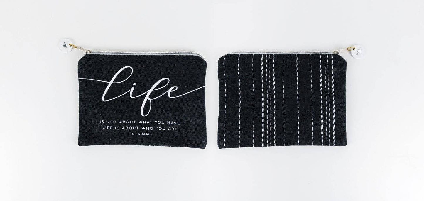 Life is about who you are - 8.5x6x.5 Canvas Clutch