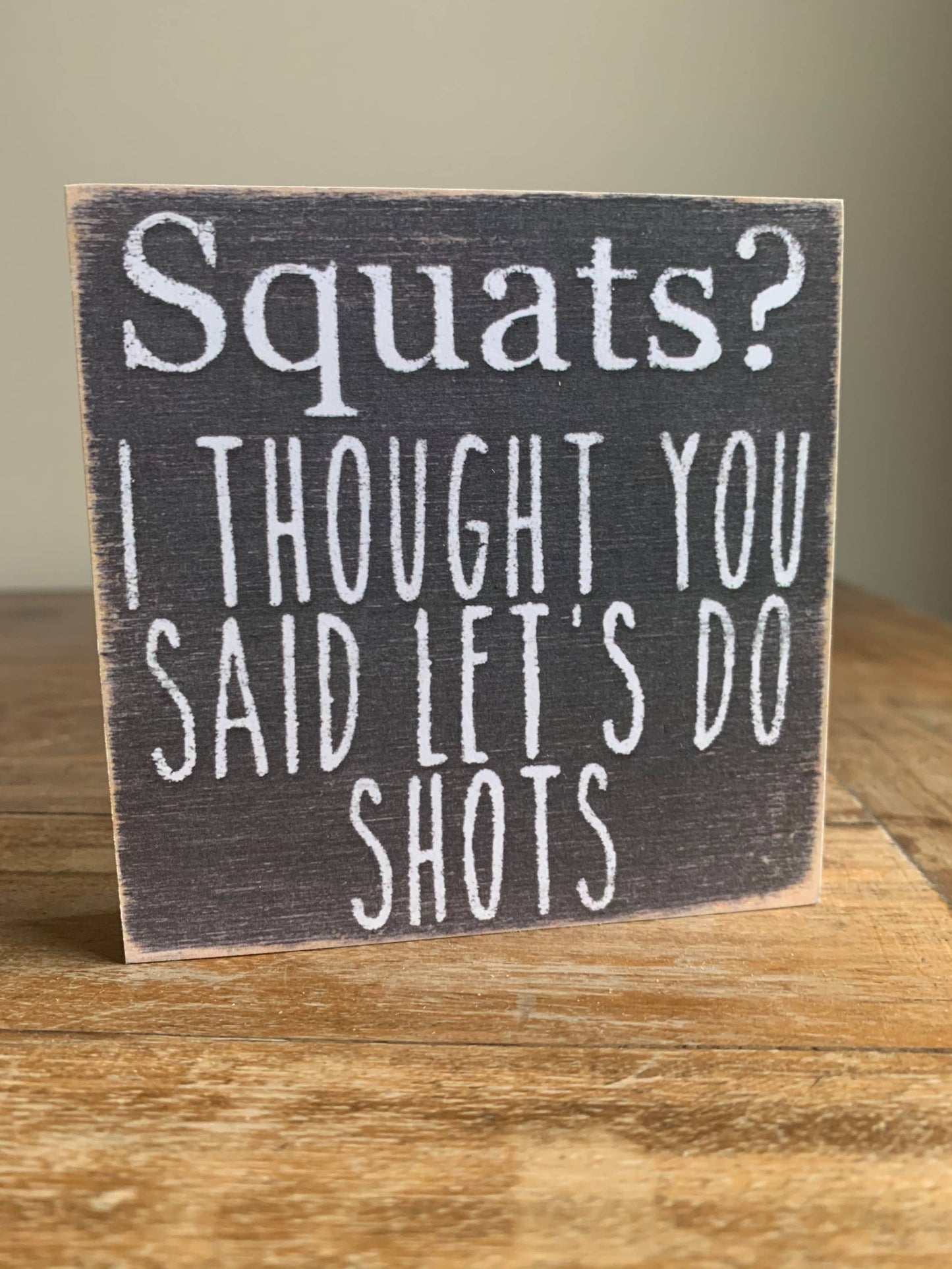 Sign - Squats